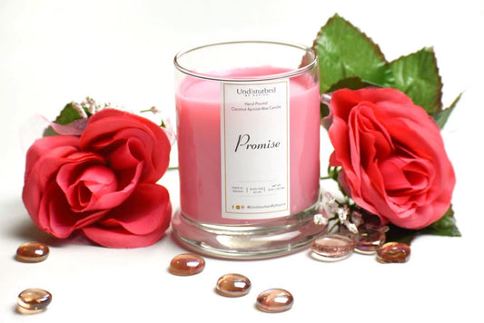 Image of sweet-scented candle for a blog post describing how candles can improve and affect mood, mental health, and one's self-care journey.